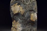 2008年，重庆的张老汉意外发现了一枚价值380万的菊花石